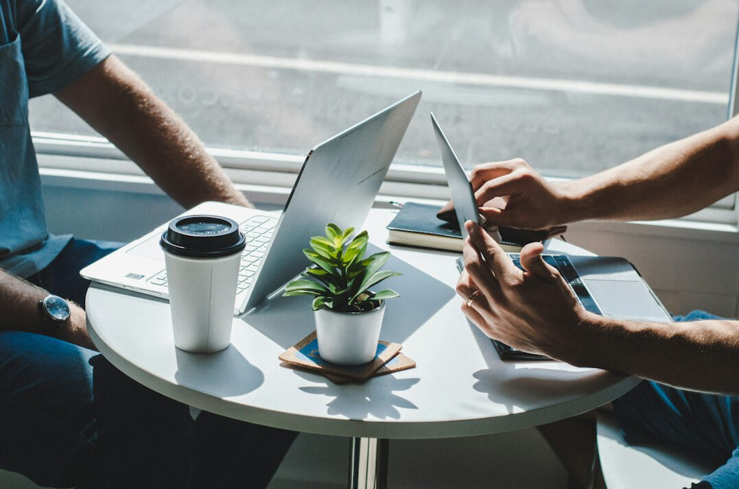 person discussing ideas in meeting