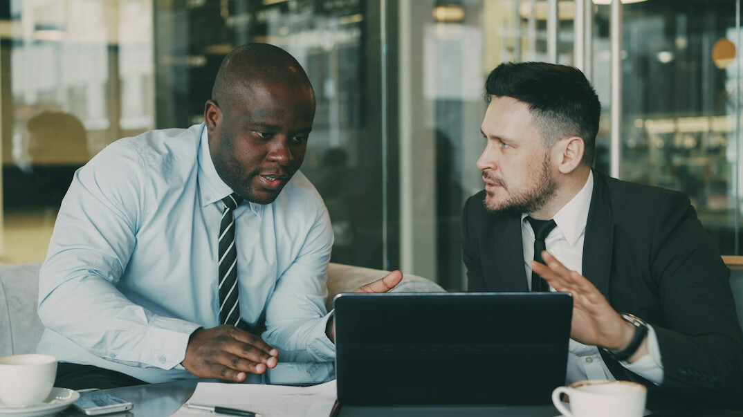 business professional speaking in meeting